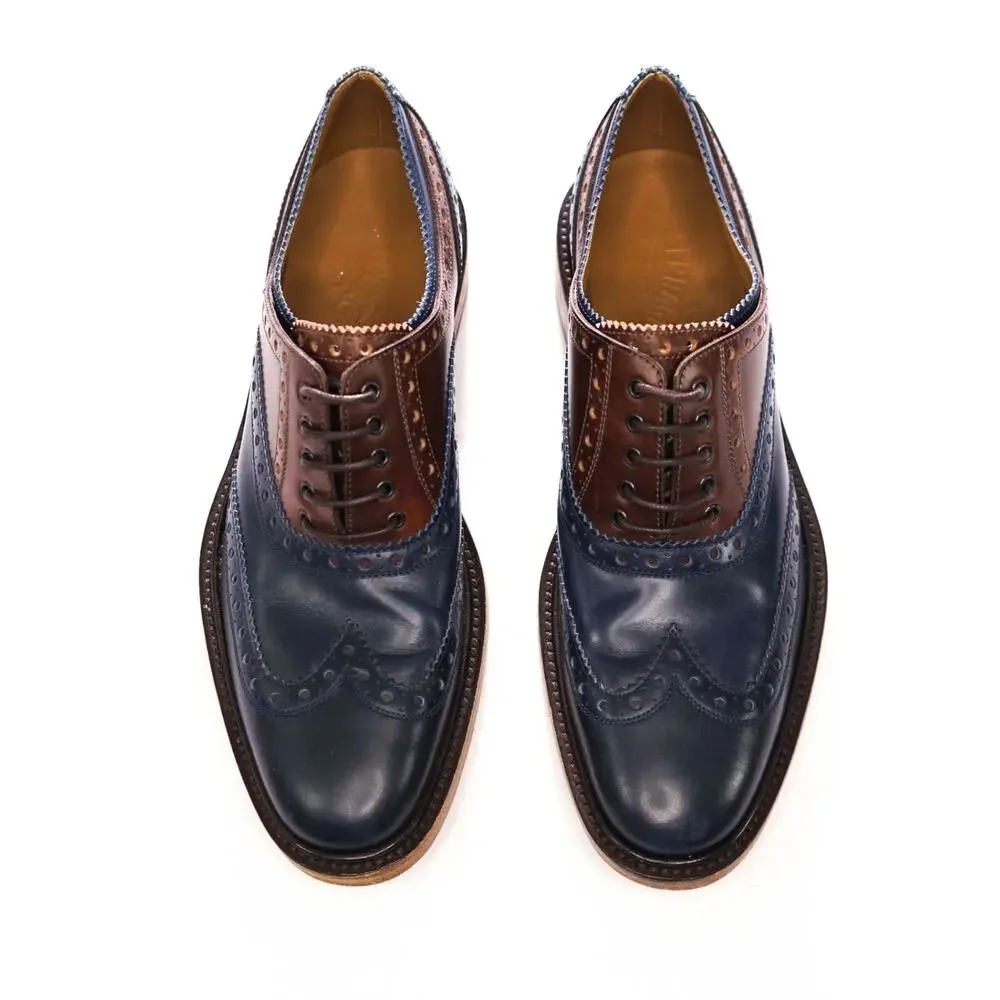 $1,250 FERRAGAMO - Navy Blue/Brown Leather Wingtip Oxfords - 9 D